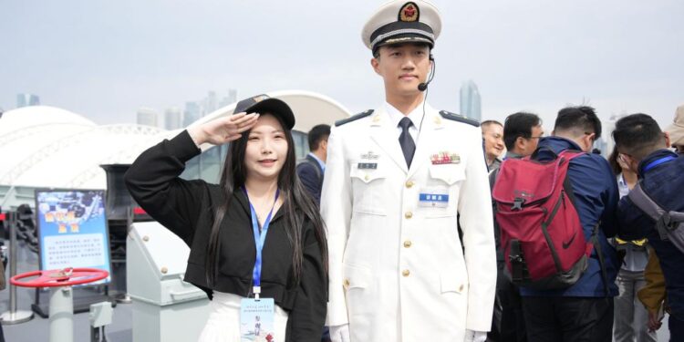 Taiwan compatriots attend PLA Navy's 77th anniversary open-day event