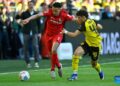 Dortmund turns landmark fixture into Champions League ticket