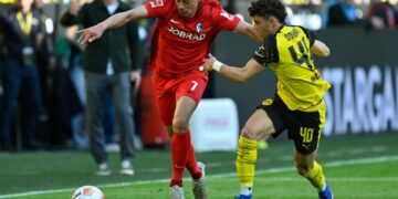 Dortmund turns landmark fixture into Champions League ticket
